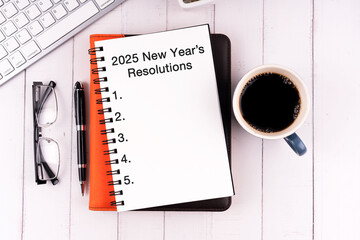 2025 New Year's Resolutions text on notepad
