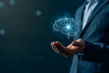 Psychology of investment and do business concept, close up hand of businessman holding brain hologram, growth mindset and positive thinking for success