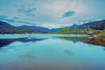 Scenic lake view from Valley Trail, Whistler, BC, Canada,  with alpine mountain backdrop
