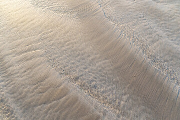 Obraz premium Sand Texture Background, Sandy Beach Pattern, Beige Ocean Dune Wallpaper, Wet Beach