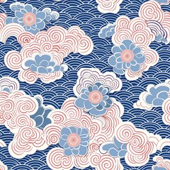 Fototapeta premium The image is a beautiful floral pattern with pink and blue flowers on a blue background