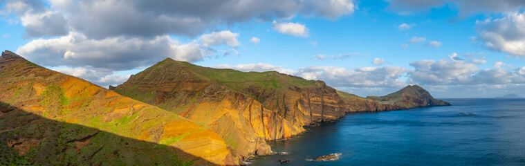 Ponta de Sao Lourenco Madeira Portugal. Scenic mountain view of green landscape, cliffs and Atlantic Ocean. Hiking active day, travel background