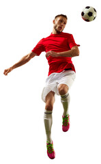 Energetic young man, professional player in red sportswear and boots training football tricks against transparent background. Concept of game, sport, recreation, active lifestyle. © Lustre Art Group 