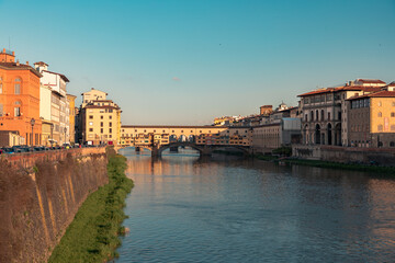 View on Ponte Vecchio Bridge in Florence during sunrise in the summertime with copy space