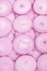 Onion slices as a background. Top view.