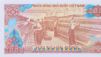 Two thousand Dong paper currency banknote is issued by Viet Nam National Bank in different...