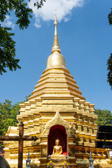 Naklejka premium Thai Buddhist Temple wat exterior in Chiang Mai, Thailand a spiritual place of Buddhism and worship and a tourist destination.