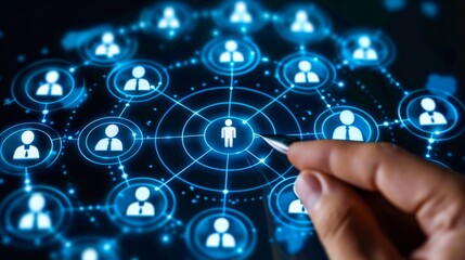 Hand pointing at a digital network of connected people icons, representing social networking, communication, and technology integration.