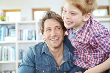 Laugh, father and son in portrait in home for bonding, playful and enjoying together in weekend. Happy family, dad and child in house for support, care and healthy connection with parent love