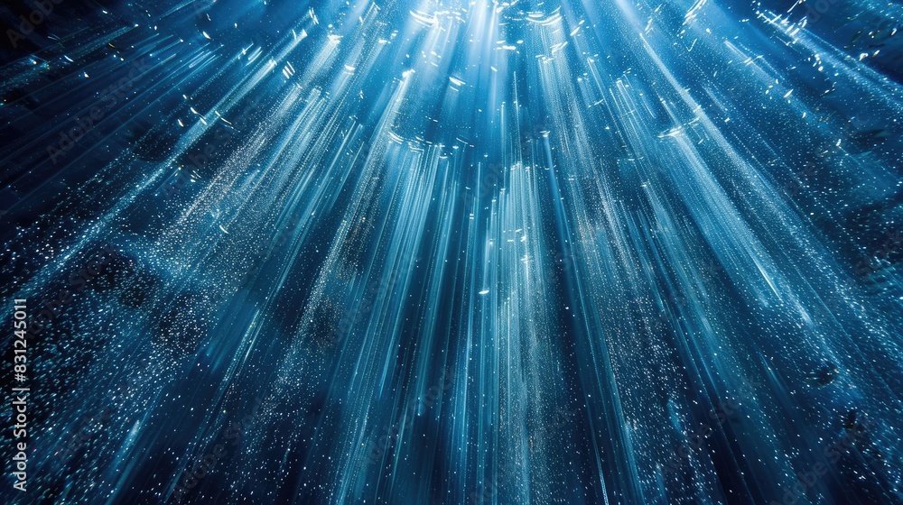 Poster enchanting loop of blue glitter particles drifting down softly in delicate light rays, creating a me