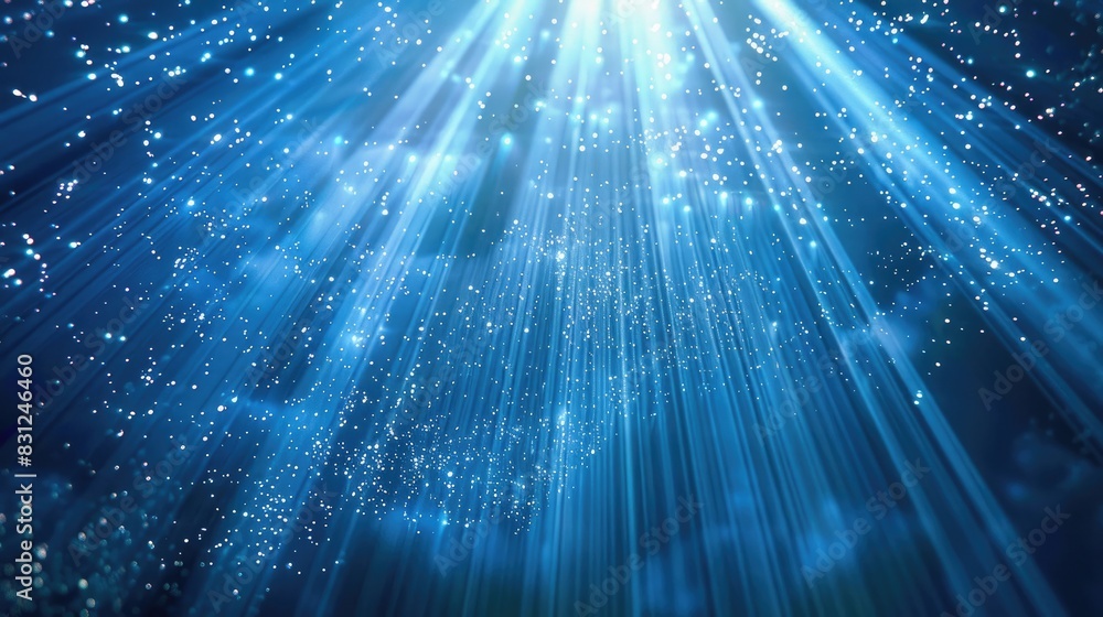 Poster enchanting and continuous loop of blue glitter particles softly descending in delicate light rays