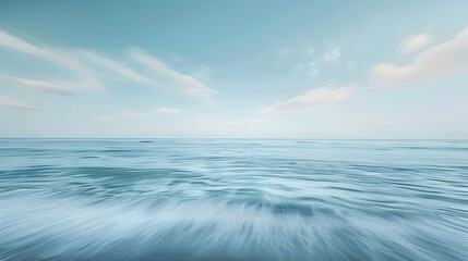 Obraz premium Tranquil ocean horizon fades into a vast sky, evoking a serene escape from daily life.