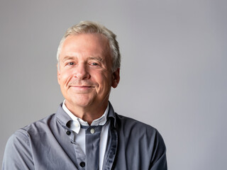 Obraz premium portrtait of a senior manager, manager smiling, face of the president