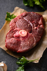 Raw uncooked lamb steak with spices