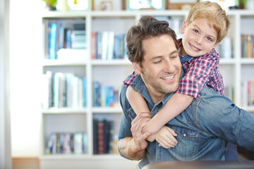 Home, father and son in portrait with piggyback for bonding, playful and enjoying together in...