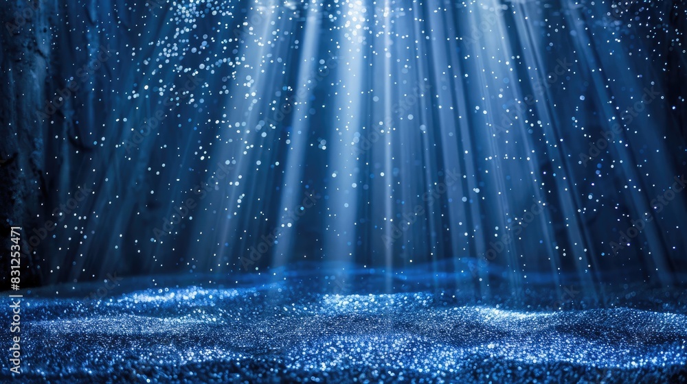 Poster delicate light rays illuminating falling blue glitter particles, creating a magical and looping visu