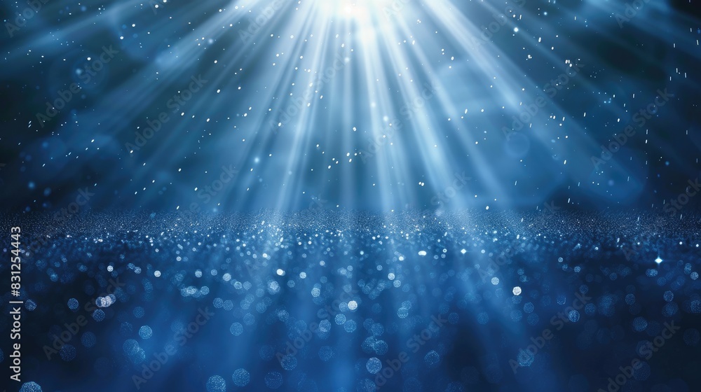Poster continuous loop of enchanting blue glitter particles descending in soft, delicate light rays