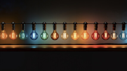 row of old fashioned multicolored light bulbs on wood surface,ideas and energy,copy space for text