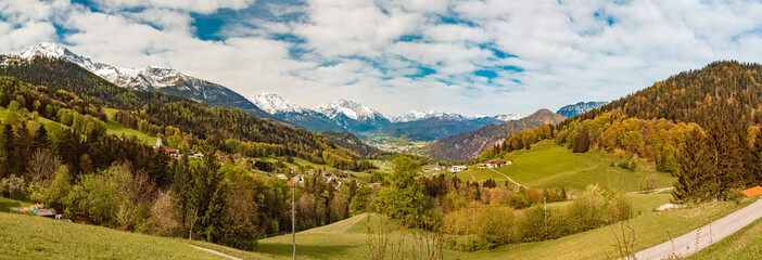 High resolution stitched alpine spring panorama with the alps in the background at the famous...