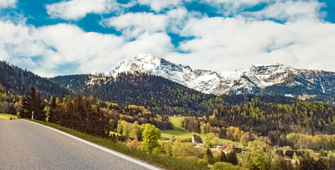 Alpine spring view with the alps in the background at the famous Rossfeld panorama road near Berchtesgaden, Bavaria, Germany