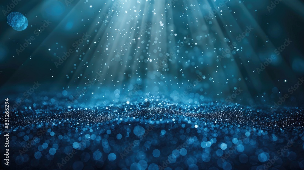 Poster blue glitter particles illuminated by delicate light rays, falling in a graceful and enchanting loop