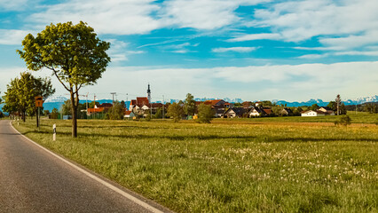 Alpine spring view with the alps in the background near Kay, Tittmoning, Traunstein, Bavaria, Germany