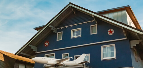 Jet airplane model in front of a house near Meersburg, Lake Bodensee, Baden-Württemberg, Germany