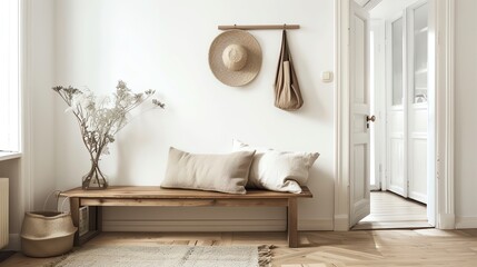 Scandinavian entryway with wooden bench, clean lines, natural light, and simple decor