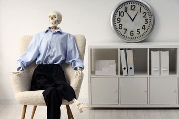 Waiting concept. Human skeleton sitting in armchair at office, space for text