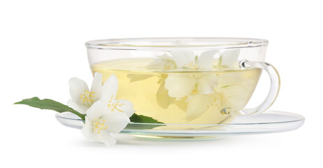 Aromatic herbal tea in glass cup, teapot and flowers isolated on white