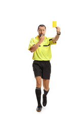 Referee running with a yellow card and blowing a whistle