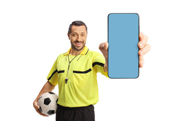 Football referee holding a ball and a smartphone with blue screen