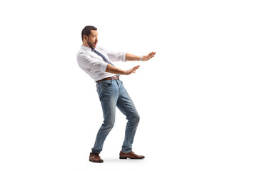 Scared young man defending himself