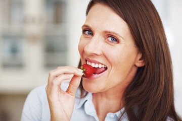 Woman, portrait and strawberry for vitamins in home, nutrition and vegan diet for healthy detox....