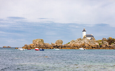 Bay with a small lighthouse on the rocks, Phare De Pontusval, Brittany, France