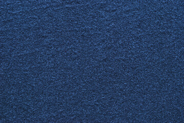 Dark blue cotton drill fabric pattern close up as background