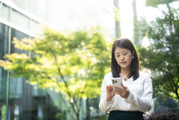 business person using mobile phone