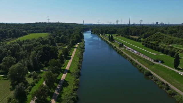 Aerial drone view of the Rhein-Herne Canal in Gelsenkirchen, Germany. The Rhine Herne kanal is a transportation canal in the Ruhr area of North Rhine-Westphalia, Germany, featuring five canal locks.