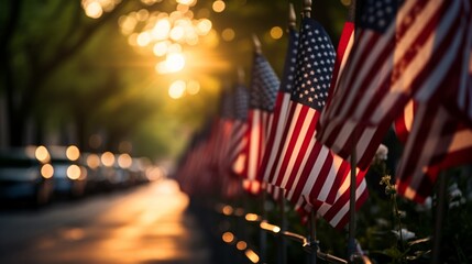 Urban memorial day scene with a row of american flags displayed along a city street