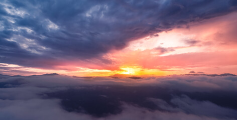 Sunrise and cloudy,Nature Landscape with thick mist or sea of fog over mountains.Aiyerweng sea of...