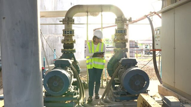A female engineer working at a water treatment plant, inspecting and maintaining the water supply system, checking chlorine levels, ensuring water quality, and overseeing the dynamo motors and control
