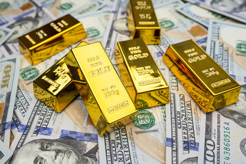 Gold bullion over 100 us dollar money
