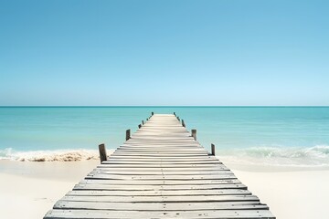 Obraz premium Wooden Pier on White Sand Beach with Turquoise Water