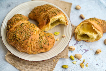 Fresh baked croissant with pistachio 