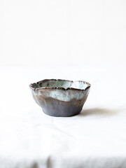 Small ceramic bowls for sauces top view. Bowls covered with glaze. Ceramic bowls on a white background. Hobby. Pottery. Handmade crafts