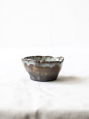 Small ceramic bowls for sauces top view. Bowls covered with glaze. Ceramic bowls on a white background. Hobby. Pottery. Handmade crafts