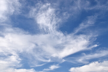 wispy white fluffy clouds on clear blue sky, cloudscape wallpaper