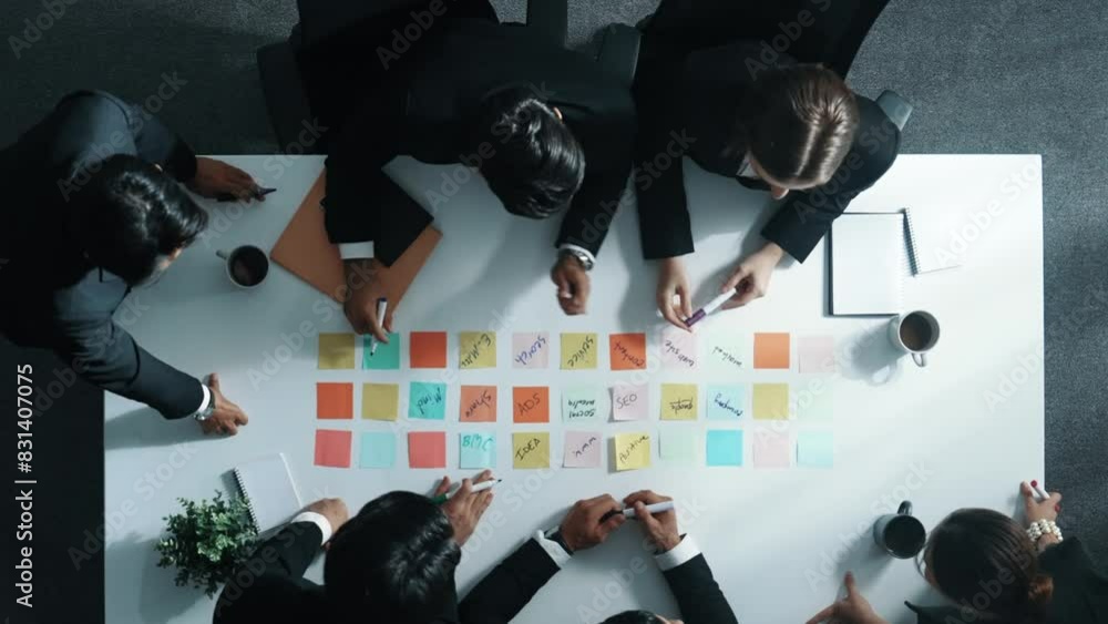 Poster smart cooperate business people writing and brainstorming business idea by using sticky notes. top v