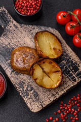 Delicious halved potatoes grilled with salt, spices and herbs