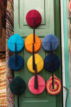 Colourful Tunisian Chechia, traditional soft wool hats popular in the Maghreb region of North Africa for sale in Souk Ech-Chaouachine, the Medina of Tunis, Tunisia